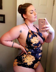 another reviewer in the bathing suit in black with yellow florals on it