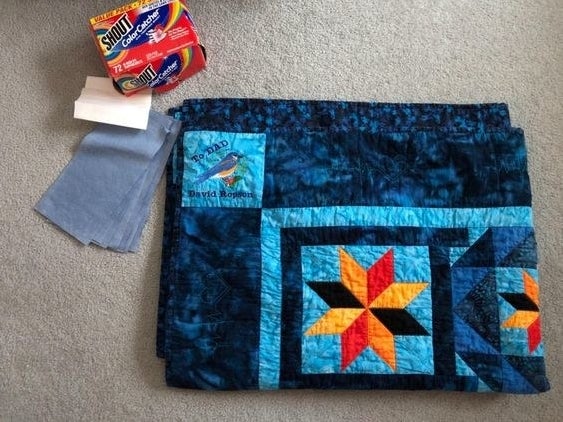 reviewer photo showing a dyed quilt next to the Shout color catchers 