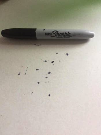 reviewer photo showing sharpie stains on a countertop