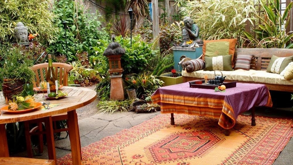 outdoor room with the rug pulling all the decor together