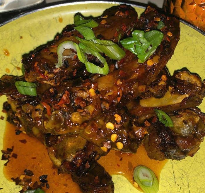 Another crowd-pleaser is the Duck Wings, which features crispy deep-fried wings of duck mixed in sweet and sour spicy sauce. The wings are topped with scallions and chili flakes. We won't judge if you lick the plates off.