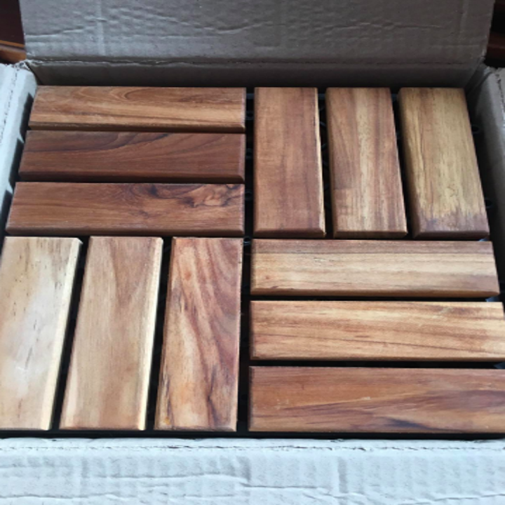 the teak tiles close up in the box