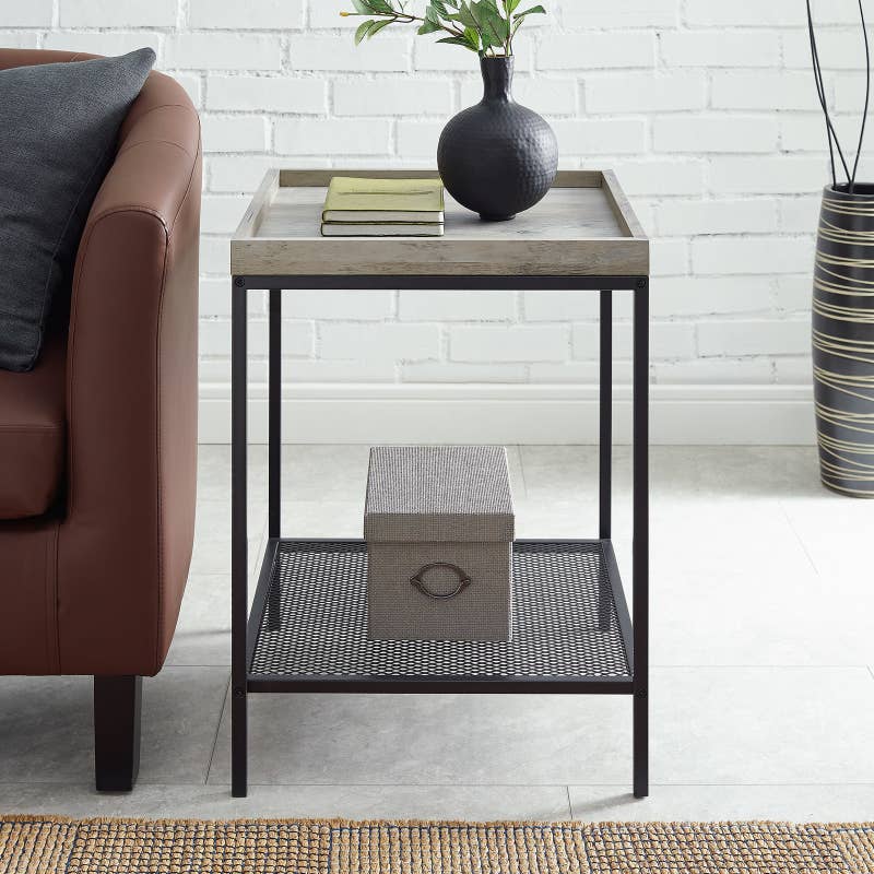 Promising review: "I really like this end table! It worked perfectly in my space and I was so glad that it was easy to build. It surprisingly looks more expensive than it is and the wood looks extremely durable. The legs are sturdy and it is overall a great piece." —citydwellerPrice: .55+ (available in three colors)