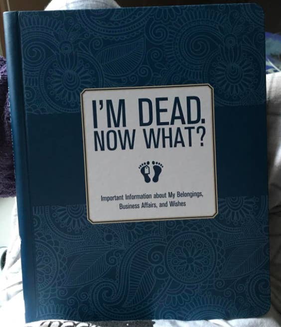 A reviewer photo of the I'm Dead, Now What? book cover. 