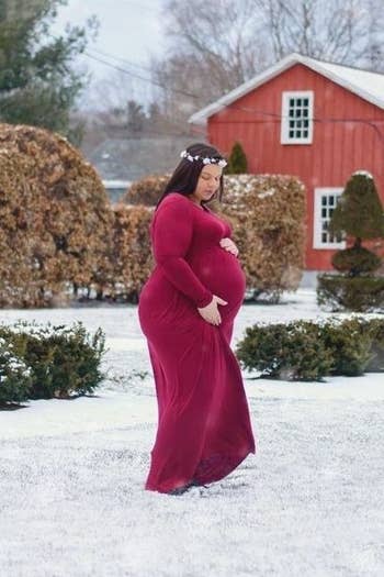 Pregnant reviewer in the maxi dress in red