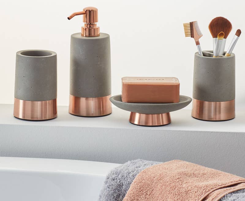Promising review: "Each piece has good weight and is well-made. The concrete is super smooth. They look great in my bathroom." —HeatherPrice: