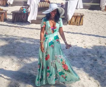 A customer review photo of the maxi dress in light green. 