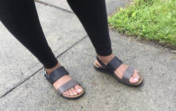 a reviewer in the black and grey sandals