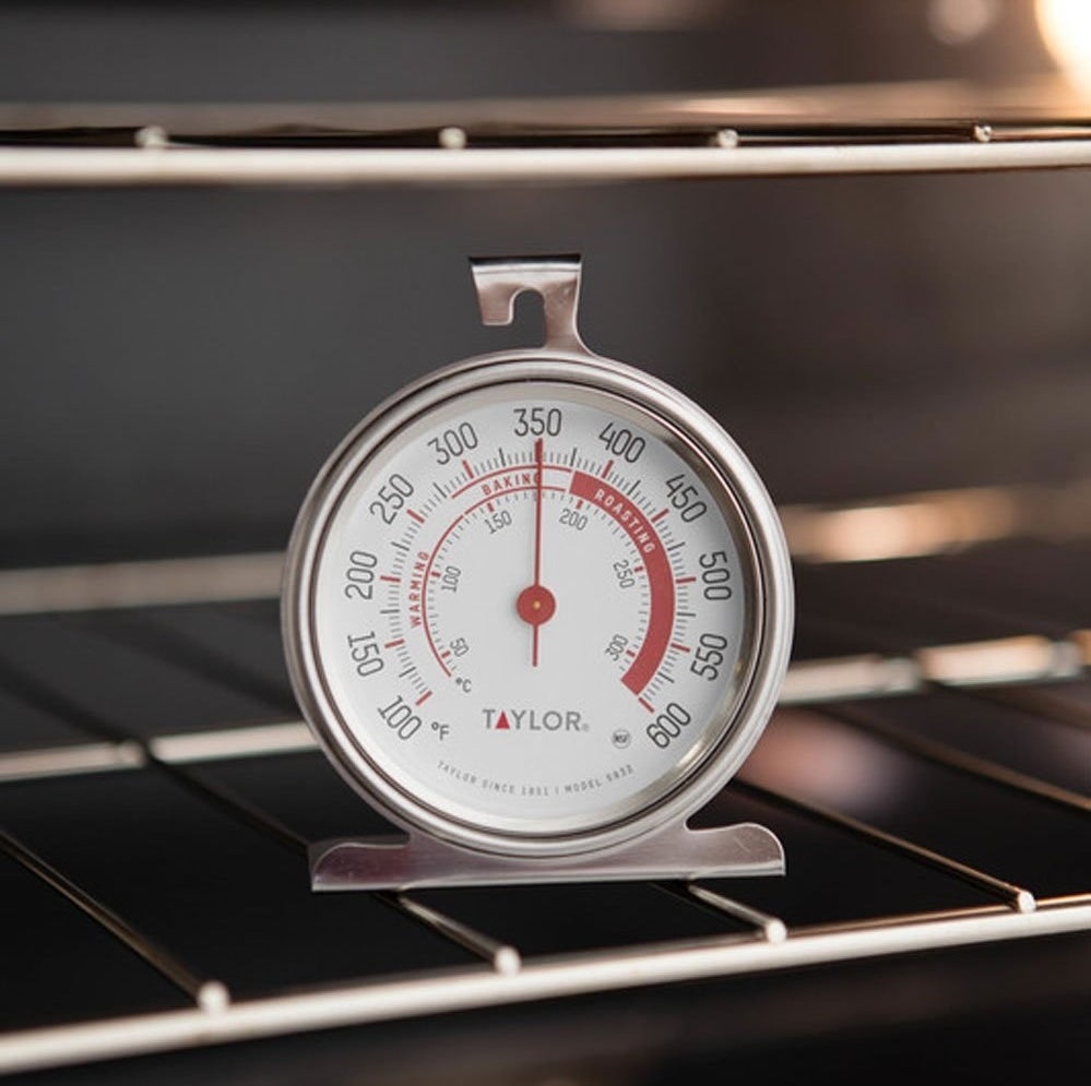 round thermometer sitting on oven rack