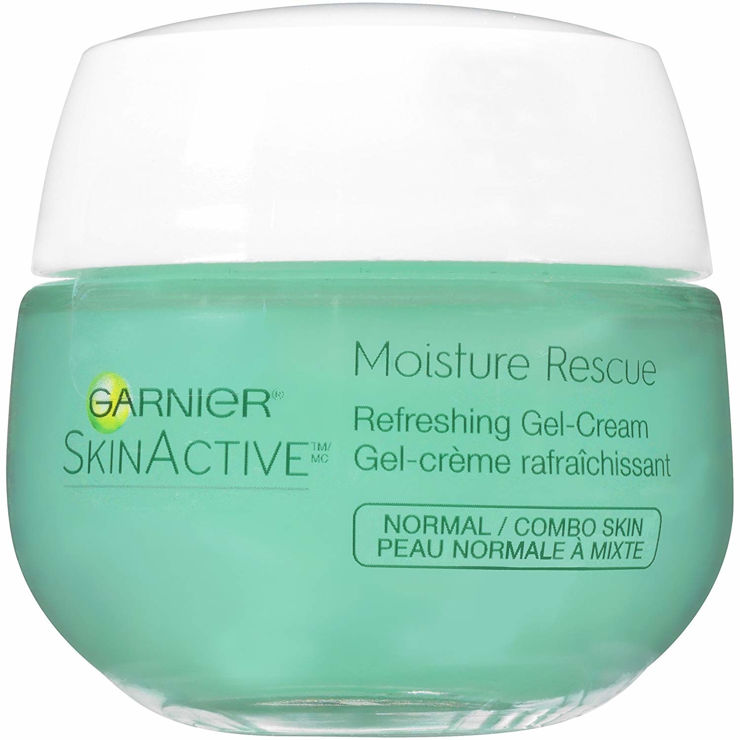 the moisturizer in a green jar with a white cap