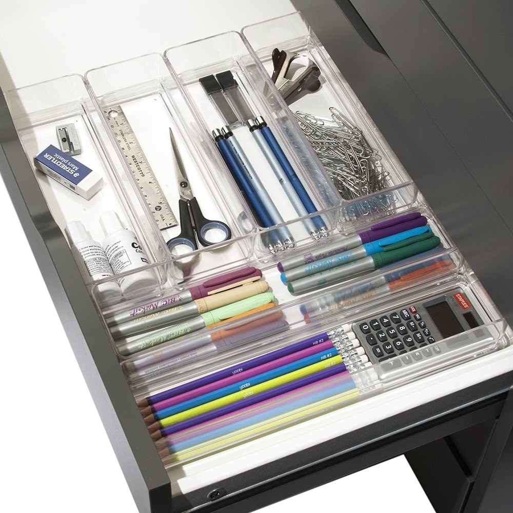 the drawer organizer holding various stationary supplies