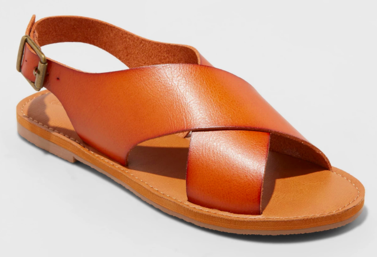 The criss-cross slingback sandals in brown. 