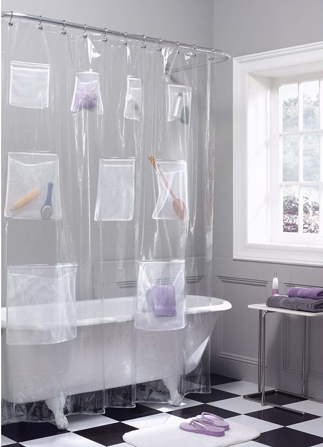 The clear plastic curtain, with two big pockets at the bottom, three medium ones in the middle, and four smaller ones near the top