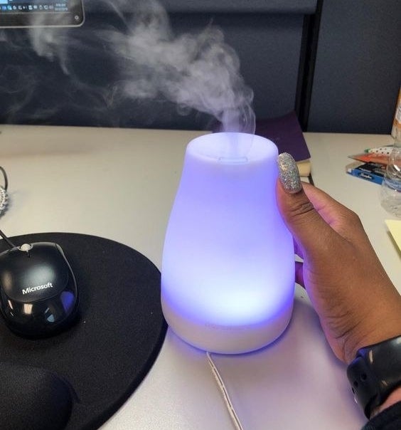 Reviewer image of the diffuser on a desk