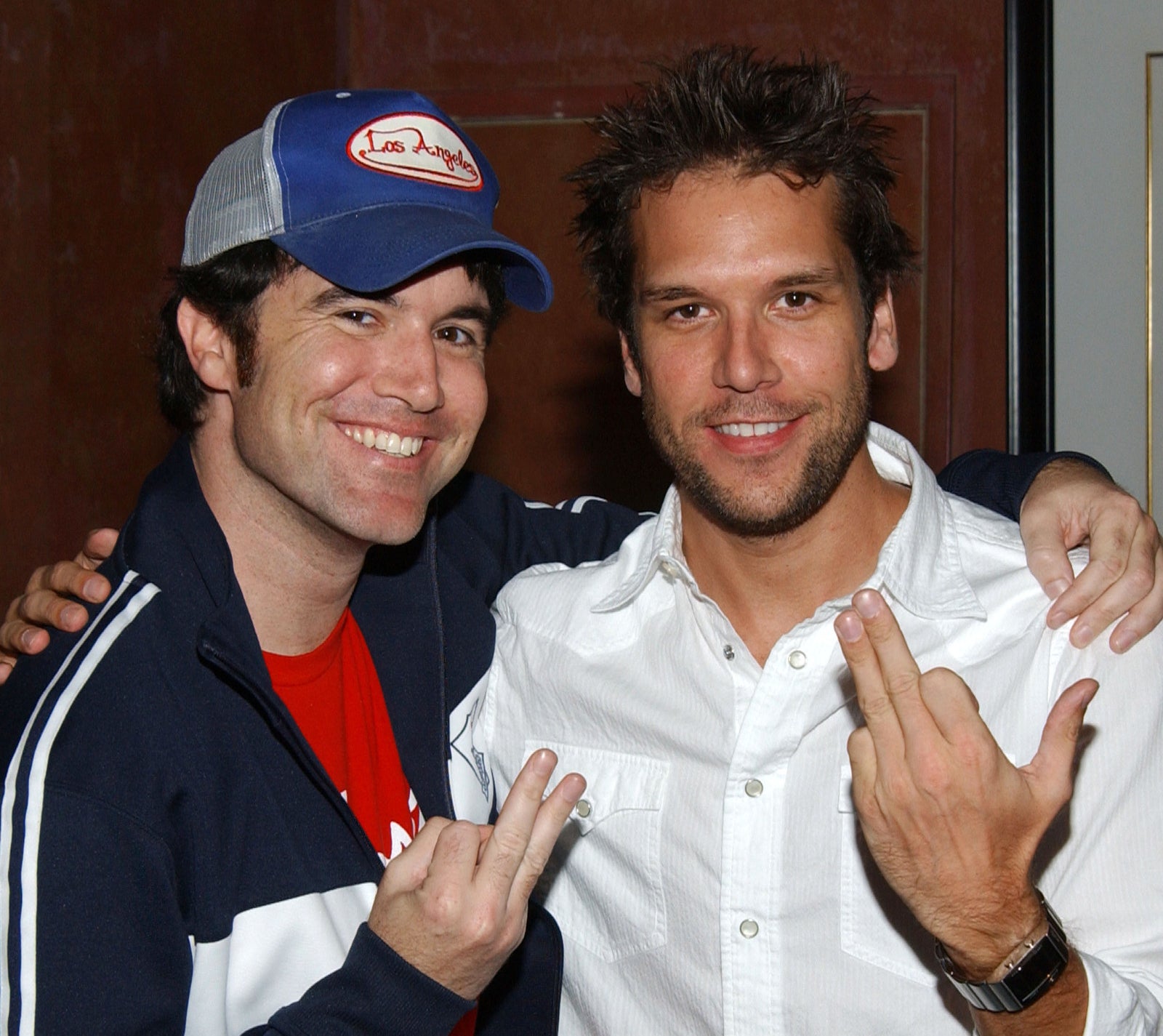 Tom hugging Dane Cook.