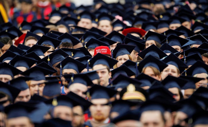 A graduate wears a &amp;amp;quot;Make America Great Again&amp;amp;quot; hat amid a sea of mortarboards before the start of commencement exercises at Liberty University in Lynchburg, Virginia, May 11.