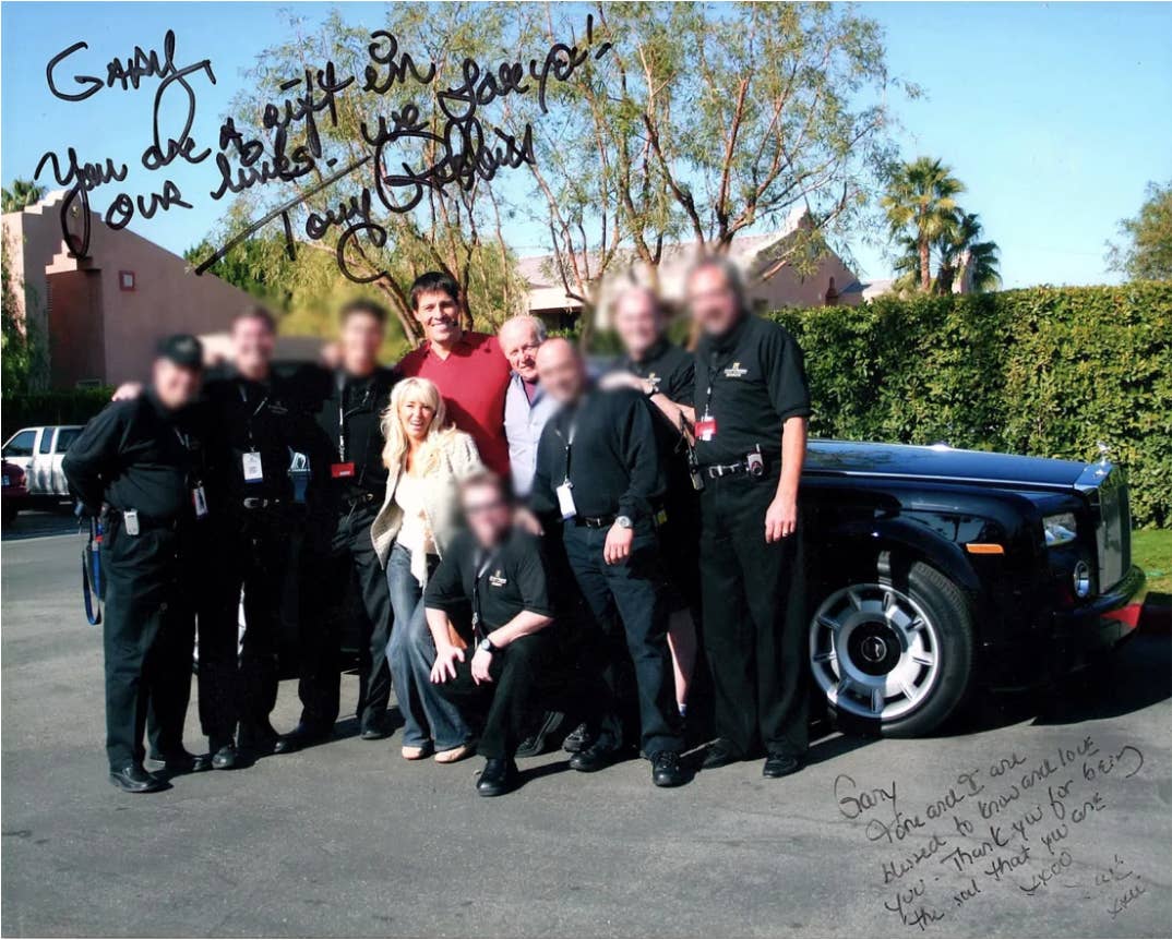 Gary King with Robbins, his current wife Sage, and their security team.
