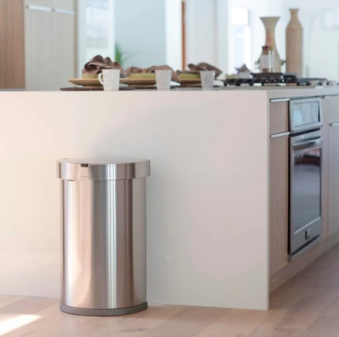 Stainless steel trash can in kitchen 