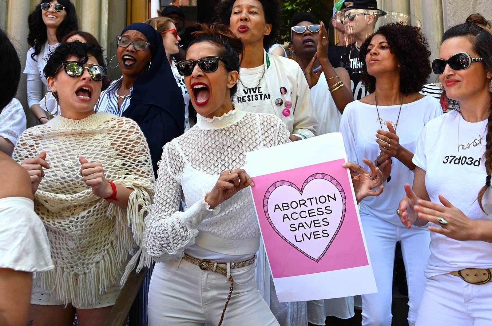 Women from the Resistance Revival Chorus take part in a rally in front of the Middle Collegiate Church in the East Village of New York City.