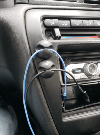 the product being using to hold chargers in a car