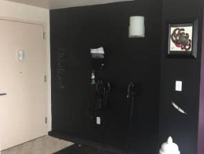 a reviewer's garage wall painted with black chalkboard paint