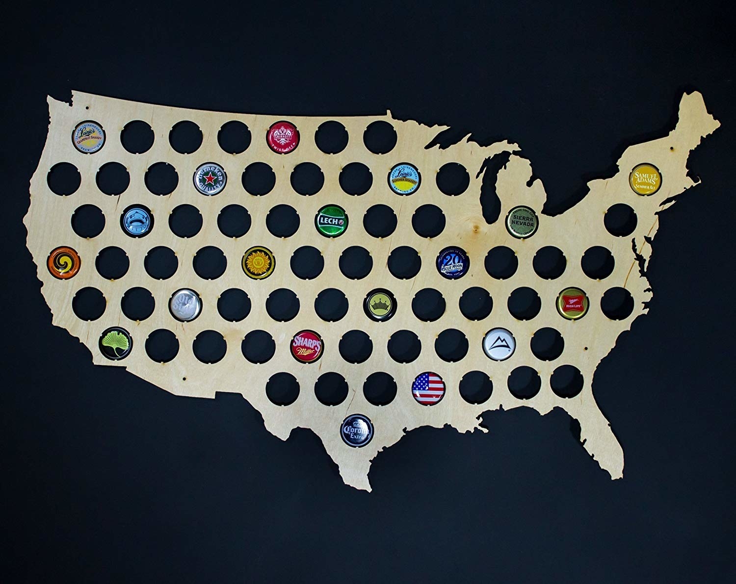 USA Beer Cap Map with an assortment of beer caps in it