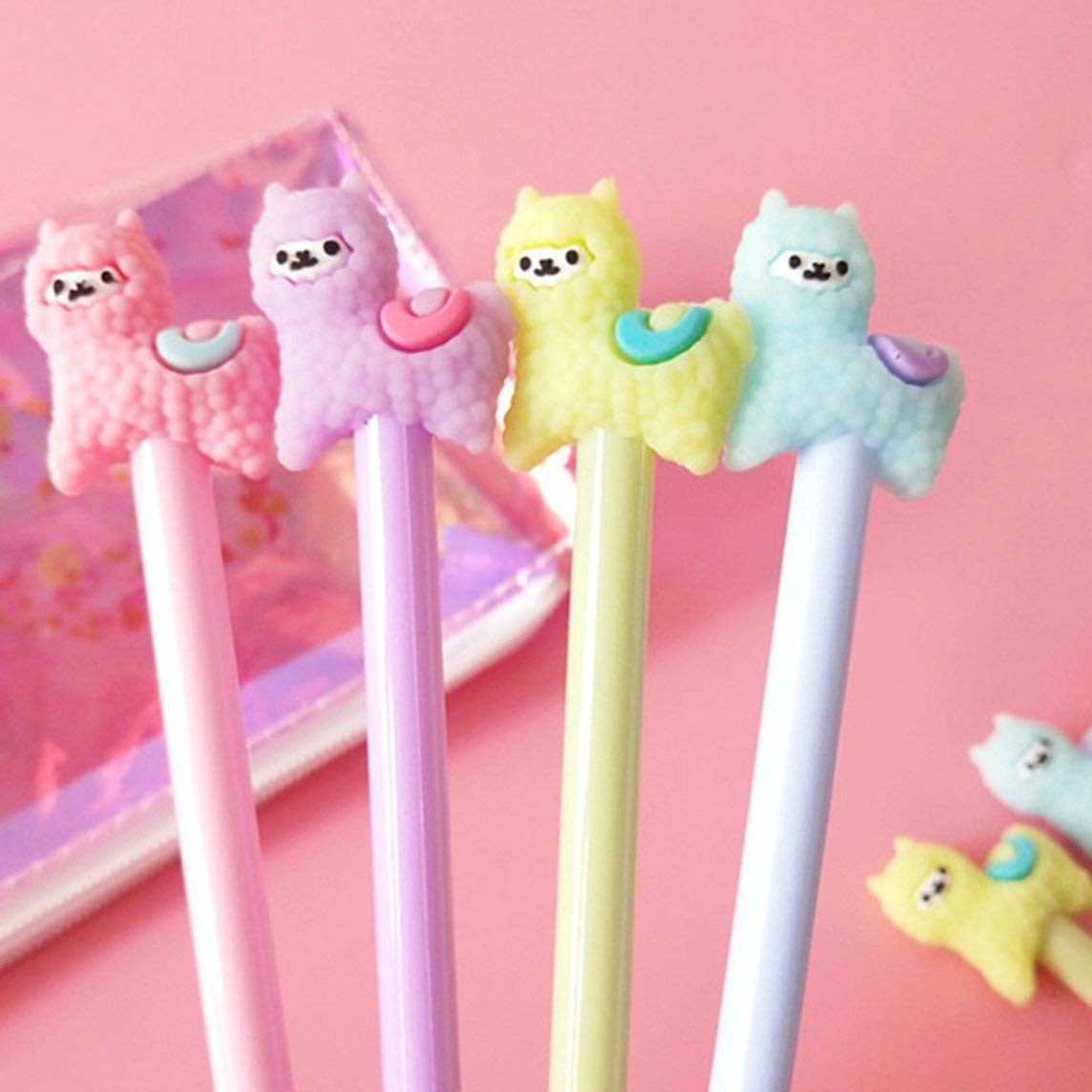 four pastel llama pens