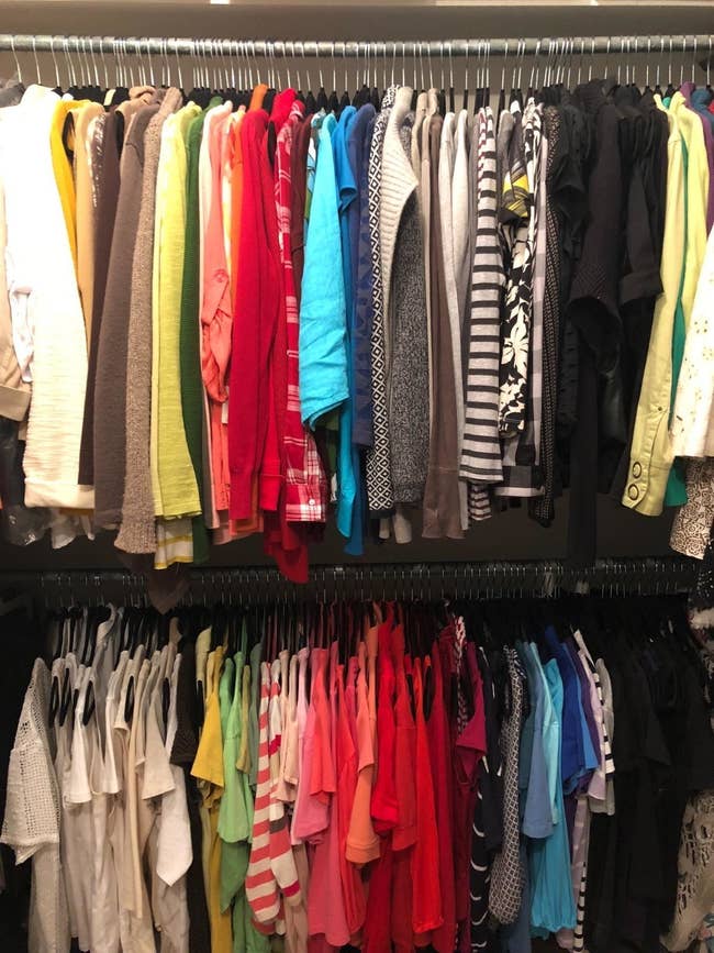 A reviewer's closet, with lots of clothes because of the slim hangers