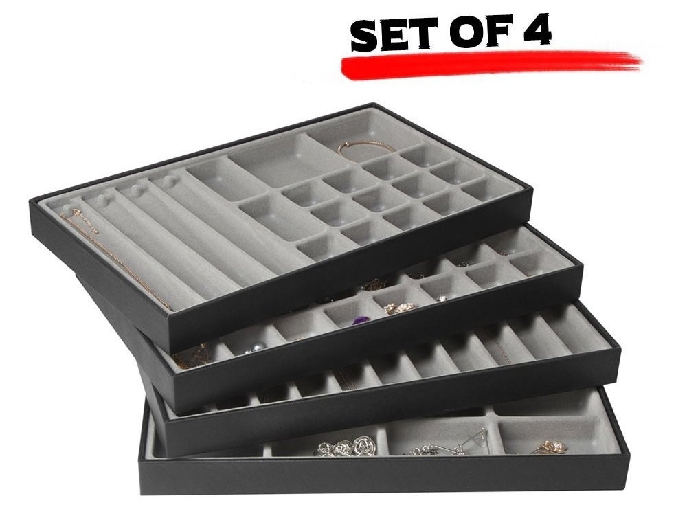 The set of four, with small and large square and long rectangular slots for different jewelry