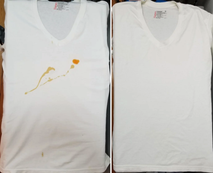 A BuzzFeed Shopping writer&#x27;s before/after of a white tee with a large orange stain, and then the same shirt completely clean