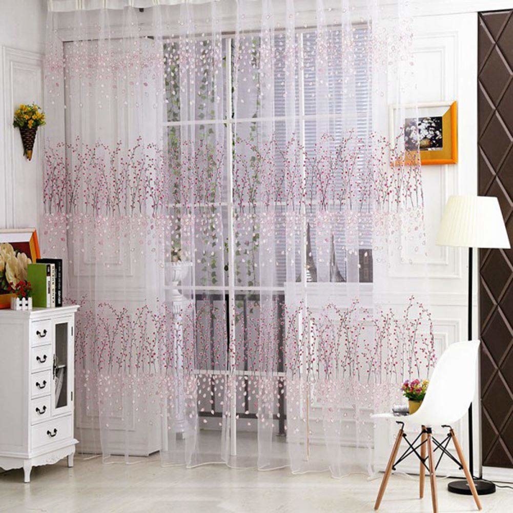 The sheer white curtains with purple floral motif
