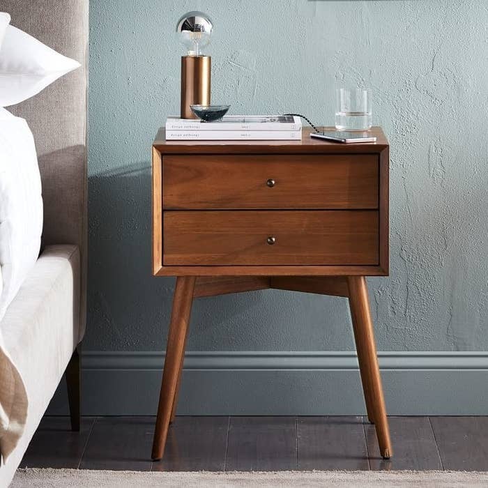 "I’ve had this bedside table for four years now, and I still love it. Because my studio apartment is truly *tiny*, these days it serves both as my bedside table and a side table to my couch. It’s beautiful and the two drawers are surprisingly roomy!" —Natalie BrownGet it from West Elm for $299.