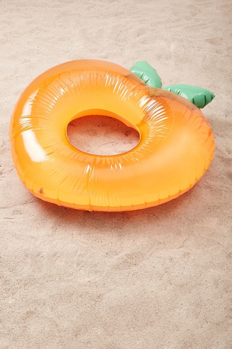 Peach clearance pool float