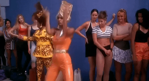 Academy Award-winning costume designer Ruth E. Carter (yes, THAT Ruth E. Carter) designed the outfits for B*A*P*S, which centers around two businesswomen who want to open a hair salon and soul food shop in Hollywood.On the costuming, Carter told Teen Vogue, “B*A*P*S created a ‘campy’ look by using unconventional fabrics with recognizable yet exaggerated shapes and fabrics that were fashioned to make a bold statement. With this, the characters become the ‘camp’ version of themselves in high society. There is a close relationship between ‘camp’ and ‘farce.’ The idea or the story is the farce. The farce influences the design. But it’s the idea of ‘failed seriousness’ that brings to life a clear story (i.e. how to look wealthy in Beverly Hills) and a bold statement, that is truly camp.”