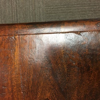 The same wooden surface looking polished and shiny
