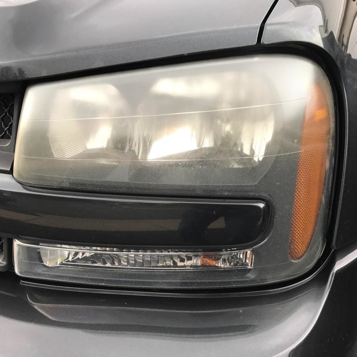 a cloudy car headlight