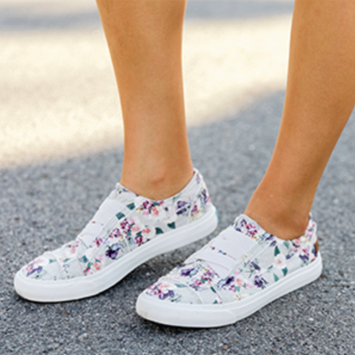 A close up shot of the floral selection, with white rubber soles and white laces
