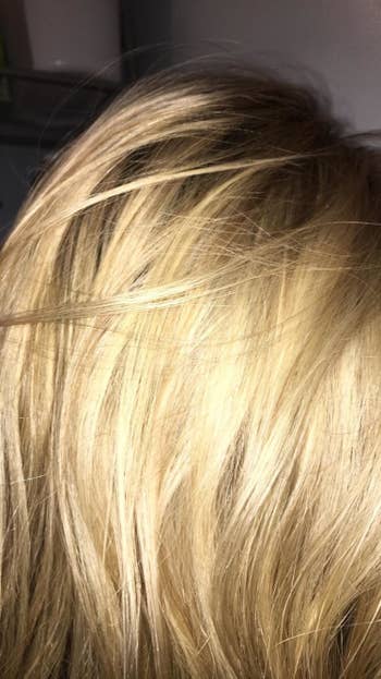 Reviewer's warm-toned blonde hair 