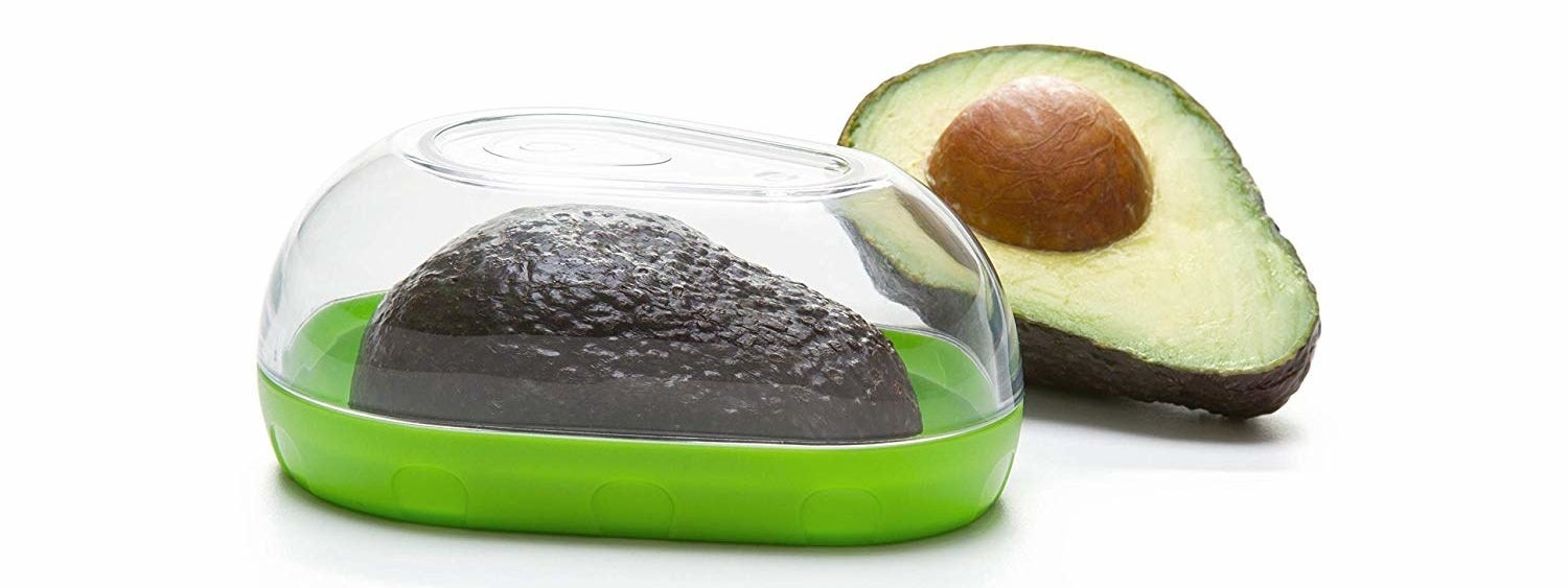 Half of an avocado inside of the avocado keeper