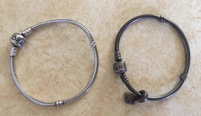 right: reviewer's bracelet looking tarnished and dark grey left: reviewer's bracelet looking shiny and silver