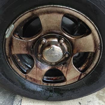 a dirty grimy car wheel