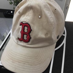 reviewer photo showing their dirty baseball cap