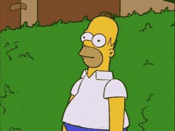 Gif of Homer Simpson from &quot;The Simpsons&quot; disappearing into a bush
