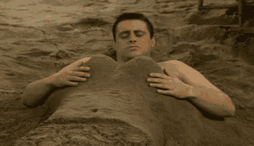 Joey Tribbiani from&quot;Friends&quot; being buried in the sand
