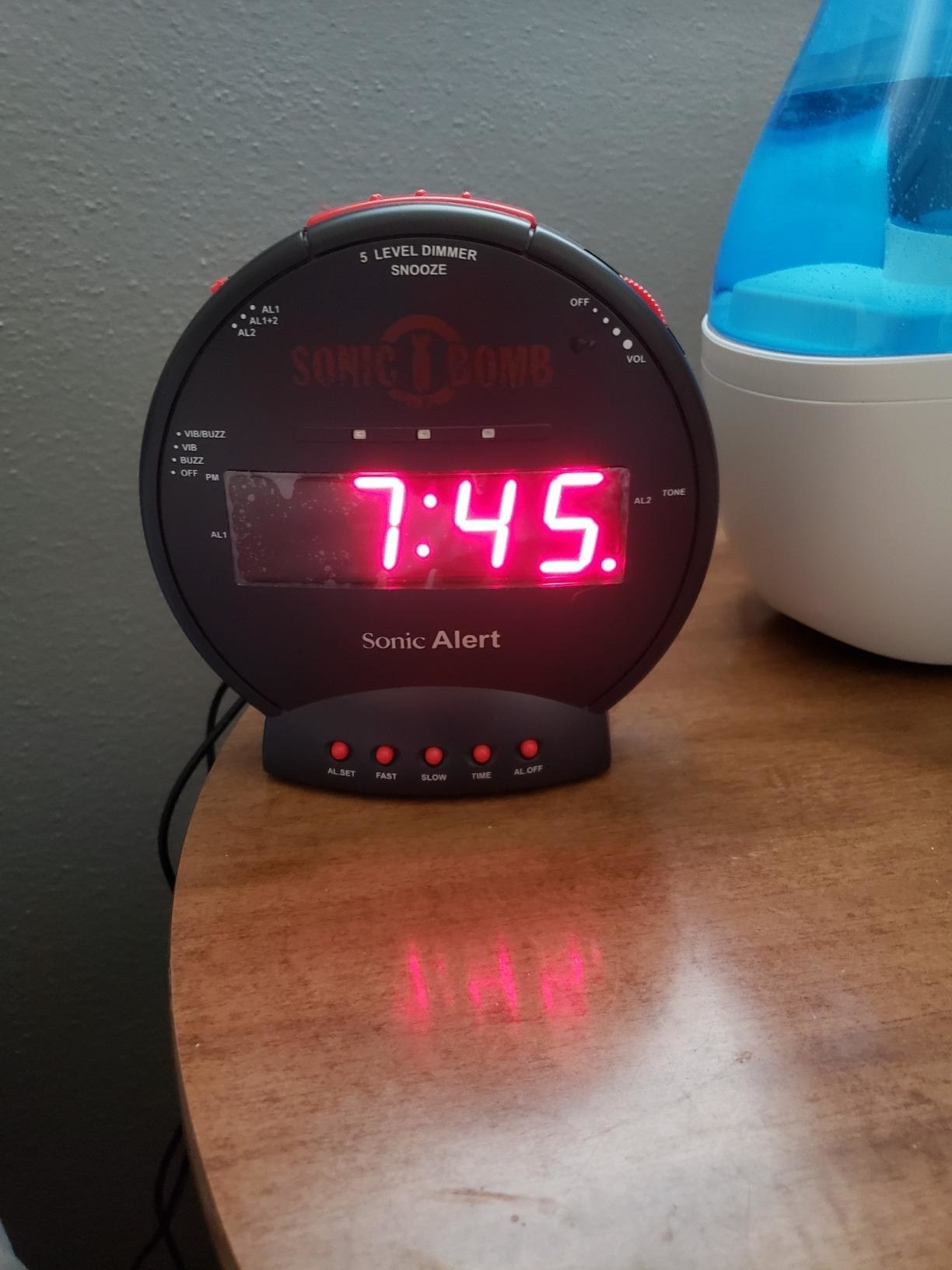The clock with digital time reading