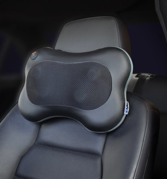 Neck massager attached to driver's seat in a car