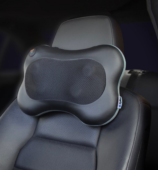 Neck massager attached to driver&#x27;s seat in a car 