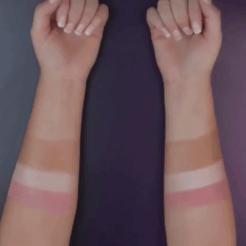 gif of two arms with swatches of makeup, both being rubbed off. One has the setting spray on, and one does not. The makeup on the arm with the setting spray stays on much better than the arm without