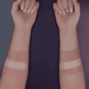 gif of two arms with swatches of makeup, both being rubbed off. One has the setting spray on, and one does not. The makeup on the arm with the setting spray stays on much better than the arm without