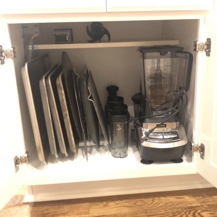 the same trays and blender organized with the rack